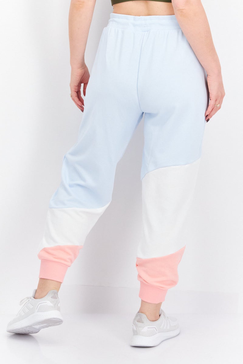 PUMA Women Sportswear Fit Brand Logo Outdoor Jogger Pants, Blue Combo - Image 4